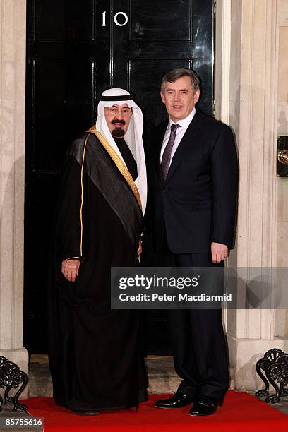 Saudi Arabian King Abdullah bin Abdul Aziz Al Saud is greeted by British Prime Minister Gordon Brown as he arrives at Downing Street for dinner on...