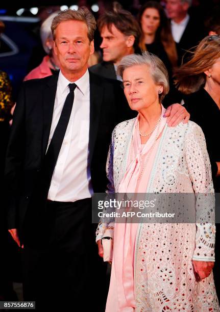 English producer Jonathan Cavendish and his mother Diana Blacker pose upon arrival for the European premiere of the film "Breathe" during the opening...