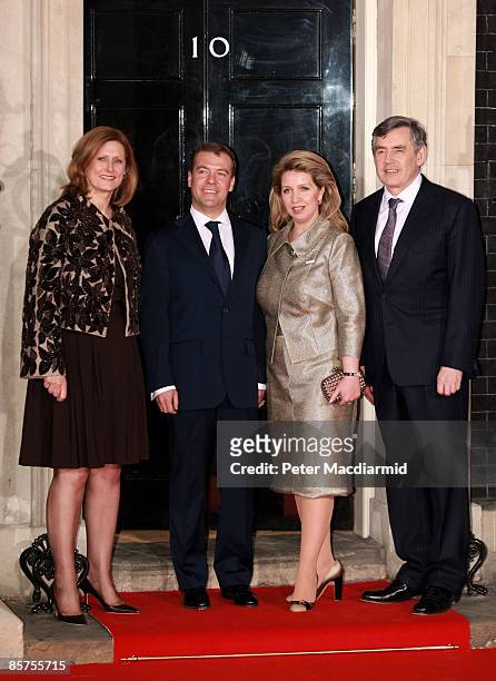 Sarah Brown wife of Gordon Brown, Russian President Dmitry Medvedev, his wife Svetlana Medvedeva and British Prime Minister Gordon Brown arrive at...
