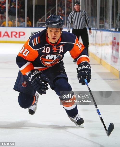 Richard Park of the New York Islanders skates against the Minnesota Wild on March 25, 2009 at Nassau Coliseum in Uniondale, New York. Wild defeat the...