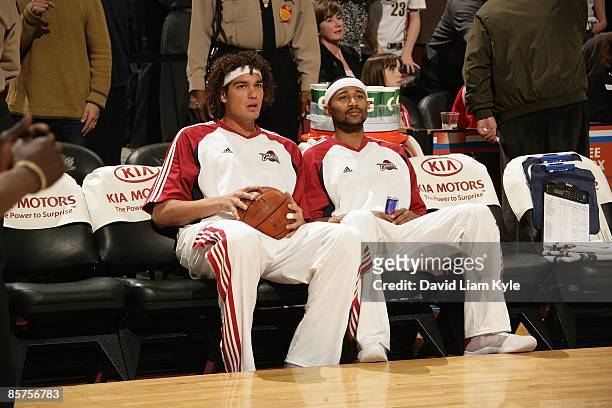 Anderson Varejao and Mo Williams of the Cleveland Cavaliers sit on the bench before the game against the Miami Heat on March 7, 2009 at Quicken Loans...