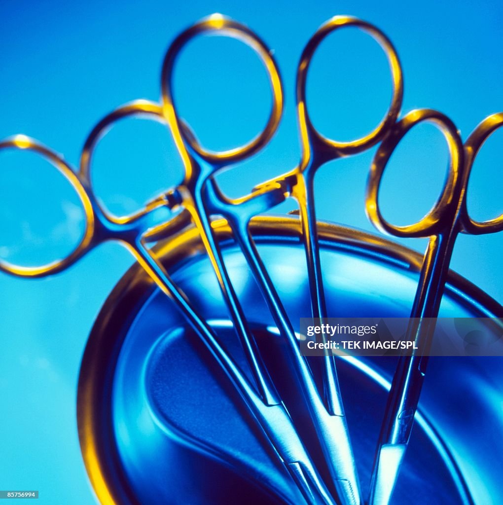 Two pairs of surgical forceps