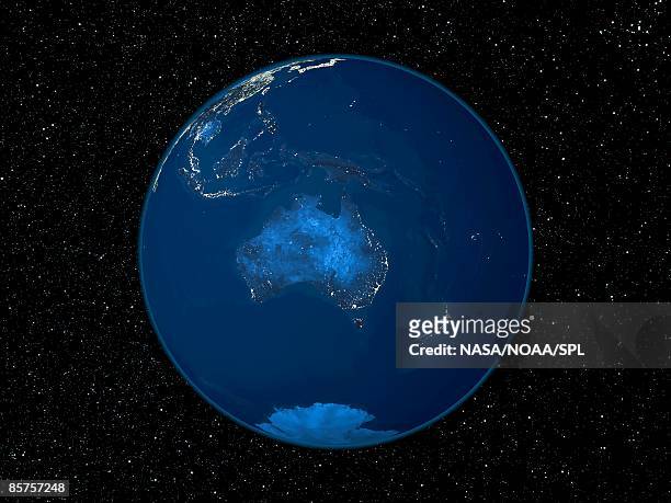 australia at night, satellite image of the earth at night - australia from space stock-fotos und bilder