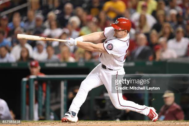 Adam Lind of the Washington Nationals takes a swing during a baseball game against the Washington Nationals at Nationals Park on September 28, 2017...