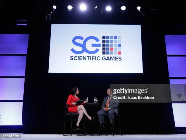 Moderator Carol Roth talks with Dave and Buster's, Inc. CEO Stephen King during Global Gaming Expo on October 4, 2017 in Las Vegas, Nevada.