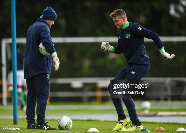 Waterford , Ireland - 4 October 2017; Mark Travers of Republic of Ireland warms up with goalkeeping coach Dermot O'Neill prior to the UEFA European...