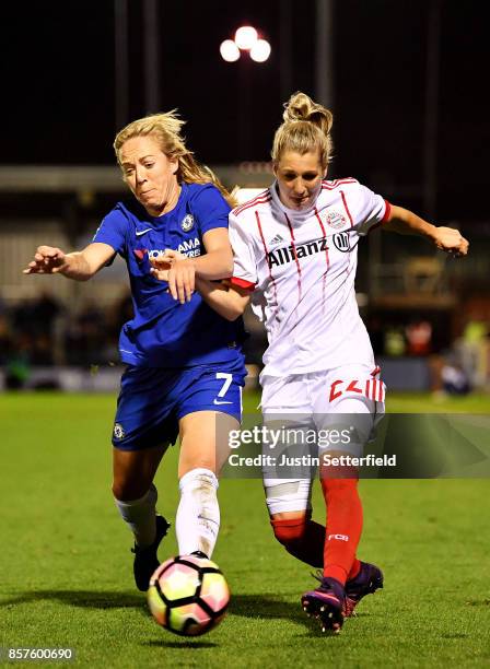 Gemma Davison of Chelsea Ladies and Verena Faißt of Bayern Munich during the UEFA Womens Champions League Round of 32: First Leg match between...