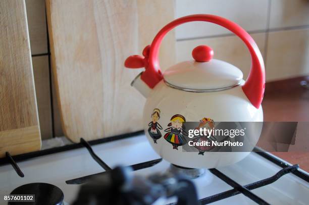 An enamelled whistling kettle is seen on a stove on 19 September, 2017.