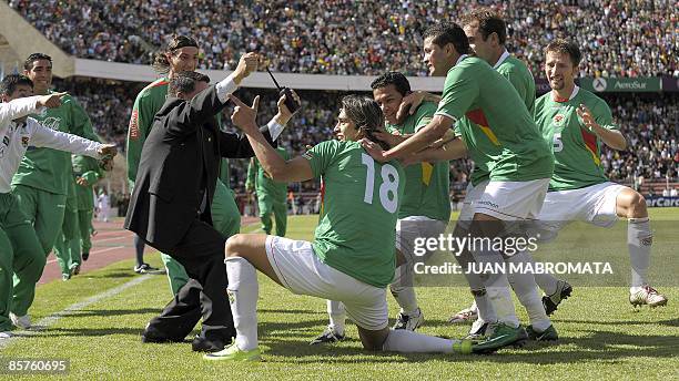 Bolivia's forward Marcelo Martins celebrates with teammates after scoring a goal against Argentina during their FIFA World Cup South Africa-2010...