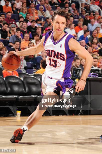 Steve Nash of the Phoenix Suns dribbles against the Utah Jazz during the game at US Airways Center on March 25, 2009 in Phoenix, Arizona. The Suns...