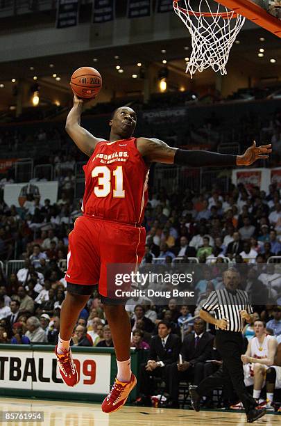 Keith Gallon of the West Team dunks against the East Team in the 2009 McDonald's All American Men's High School Basketball Game at BankUnited Center...