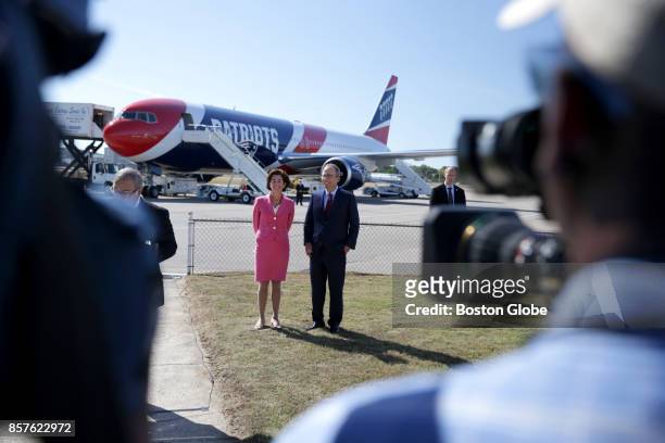 Rhode Island Governor Gina Raimondo, left, stands with New England Patriots President Jonathan Kraft during an afternoon press conference prior to...