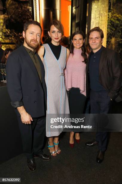 Niklas Worgt, Eva Padberg, Felicitas Rombold and Daniel Bruehl attend an EAMES Celebration by HUGO BOSS and Vitra Design Museum at Lapidarium on...