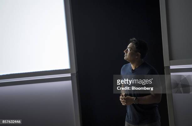 Rishi Chandra, senior product manager of Google Inc., watches a presentation during a product launch event in San Francisco, California, U.S., on...