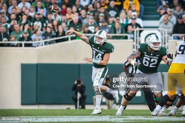 Spartans quarterback Brian Lewerke unloads a pass during a Big Ten Conference NCAA football game between Michigan State and Iowa on September 30 at...