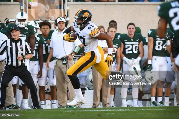 Hawkeyes tight end Noah Fant sprints for a first down during a Big Ten Conference NCAA football game between Michigan State and Iowa on September 30...