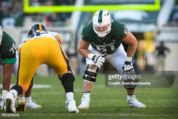 Spartans offensive tackle Cole Chewins prepares for a snap during a Big Ten Conference NCAA football game between Michigan State and Iowa on...