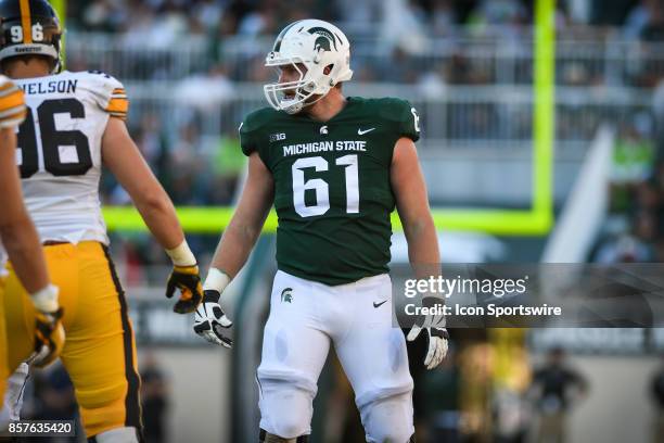 Spartans offensive tackle Cole Chewins walks up to the line of scrimmage during a Big Ten Conference NCAA football game between Michigan State and...