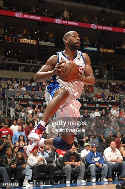 Baron Davis of the Los Angeles Clippers saves a loose ball during a game against the New Orleans Hornets at Staples Center on April 1, 2009 in Los...