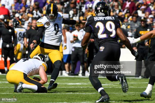 Pittsburgh Steelers kicker Chris Boswell kicks a field goal out of the hold of punter Jordan Berry on October 1 at M&T Bank Stadium in Baltimore, MD.