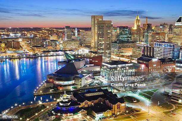 baltimore skyline and inner harbor, evening - baltimore skyline stock pictures, royalty-free photos & images