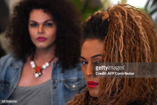 Vocalists of the Brazilian Band "As Bahias e a Cozinha Mineira", Raquel Virginia and Assucena Assucena pose for a picture after an exclusive...
