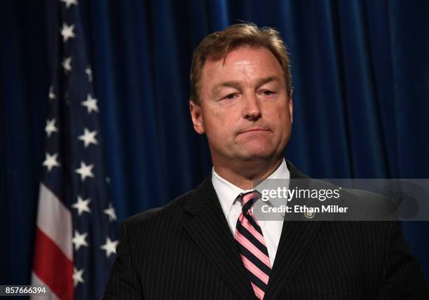 Sen Dean Heller speaks during a news conference at the Las Vegas Metropolitan Police Department headquarters to brief members of the media on a mass...