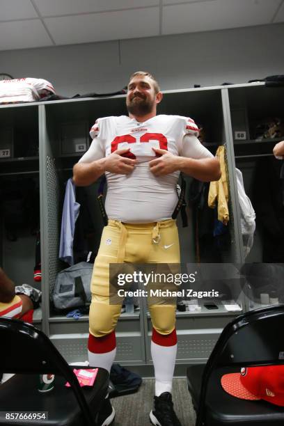 Brandon Fusco of the San Francisco 49ers gets ready in the locker room prior to the game against the Arizona Cardinals at the University of Phoenix...