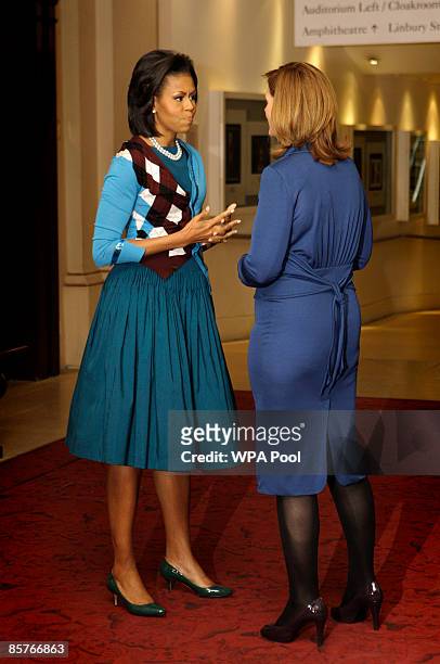 The wife of Britain's Prime Minister Sarah Brown greets U.S. First lady Michelle Obama as the G-20 spouses visit the Royal Opera House in Covent...