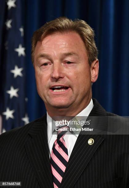 Sen Dean Heller speaks during a news conference at the Las Vegas Metropolitan Police Department headquarters to brief members of the media on a mass...