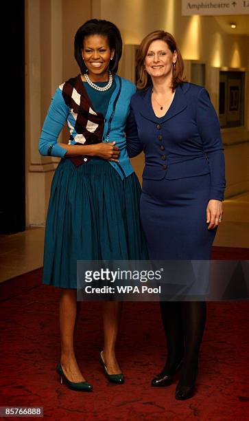 The wife of Britain's Prime Minister Sarah Brown greets U.S. First lady Michelle Obama as the G-20 spouses visit the Royal Opera House in Covent...