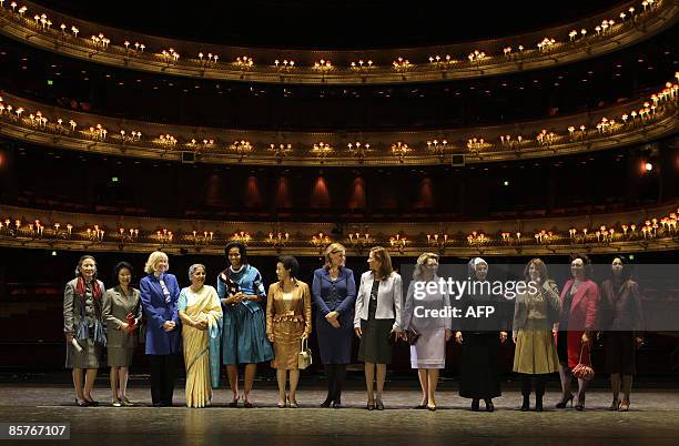 Some of the wives of G20 leaders and delegates pose for a group picture during their visit to the Royal Opera House, in London, on April 2, 2009. Ban...