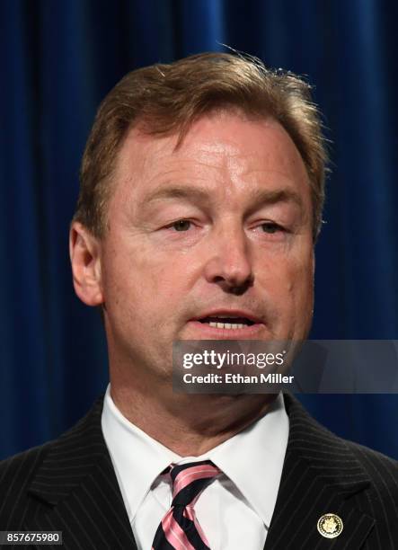 Sen Dean Heller speaks during a news conference at the Las Vegas Metropolitan Police Department headquarters to brief members of the media on a mass...