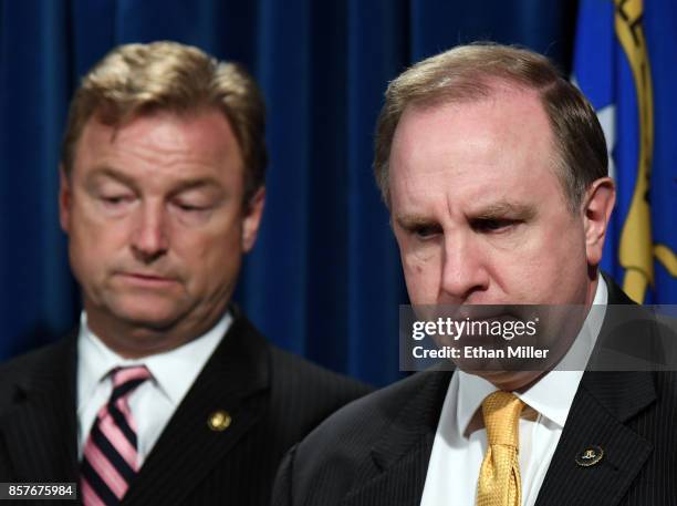 Sen Dean Heller and FBI Las Vegas Division Special Agent in Charge Aaron Rouse attend a news conference at the Las Vegas Metropolitan Police...