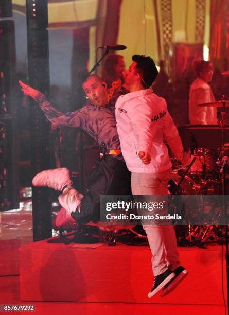Cole Whittle and Joe Jonas of DNCE perform onstage at the Westfield Century City Reopening Celebration on October 3, 2017 in Century City, California.