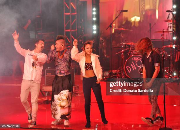 Joe Jonas, Cole Whittle, JinJoo Lee and Jack Lawless of DNCE perform onstage at the Westfield Century City Reopening Celebration on October 3, 2017...