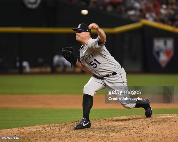 Colorado Rockies relief pitcher Jake McGee delivers a pitch in the eighth inning against the Arizona Diamondbacks during the NL Wild Card Game on...