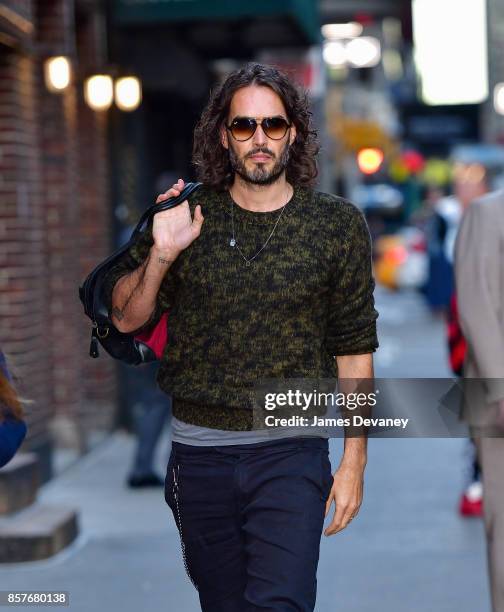Russell Brand arrives to the 'The Late Show With Stephen Colbert' at the Ed Sullivan Theater on October 4, 2017 in New York City.