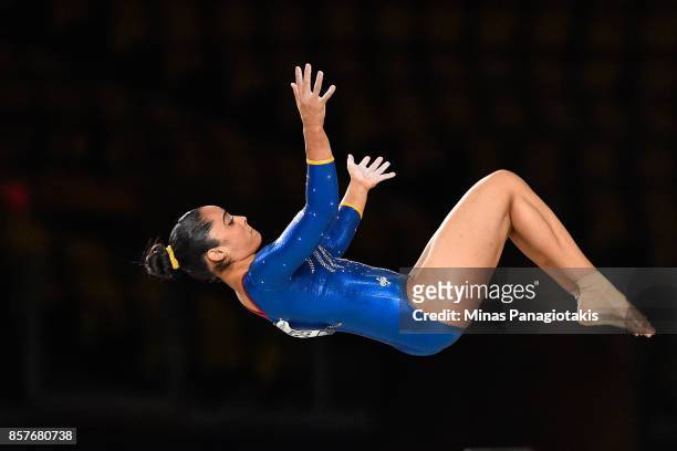 Betancur Escobar Ginna of Colombia competes on the balance beam during the qualification round of the Artistic Gymnastics World Championships on...