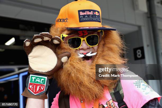 Max Verstappen of Netherlands and Red Bull Racing fan poses for a photo during previews ahead of the Formula One Grand Prix of Japan at Suzuka...