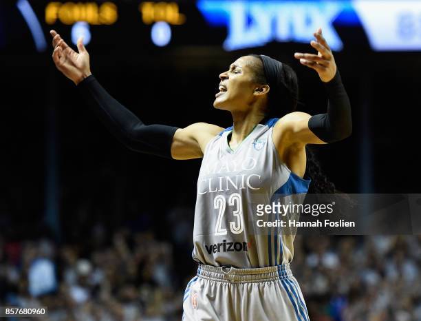 Maya Moore of the Minnesota Lynx pumps up the crowd in the final minute of Game Five of the WNBA Finals against the Los Angeles Sparks on October 4,...