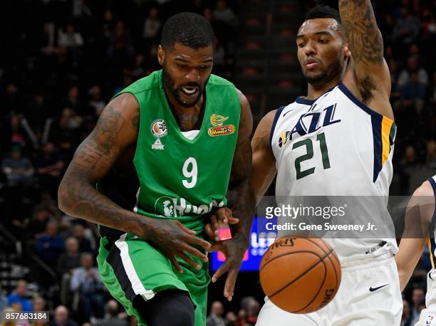 Josh Smith of the Maccabi Haifa loses the ball while being defended by Joel Bolomboy of the Utah Jazz during the second half of the 117-78 win by the...