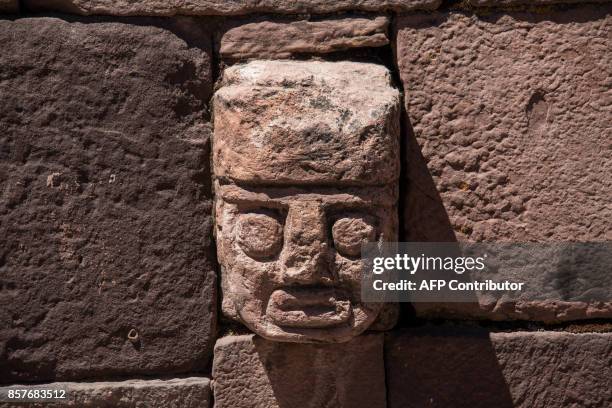 View of a wall with different faces at the Semi-Subterranean Temple, part of the archaeological site of Tiwanaku , some 71 Km east of La Paz, Bolivia...