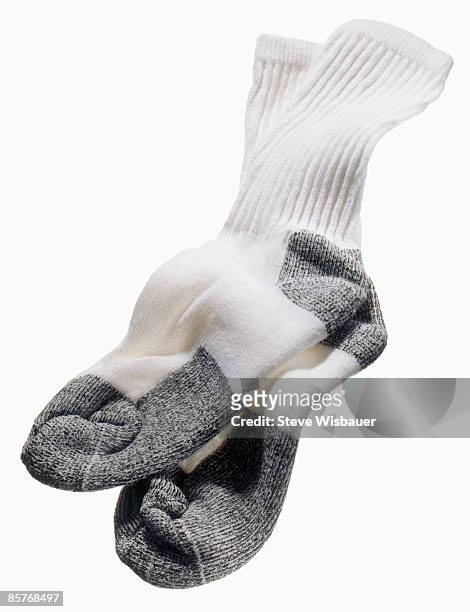 white and grey gym men's sweat or tube socks pair - smelly laundry stock pictures, royalty-free photos & images