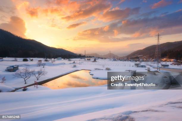 aerial view of countryside of yamanouchi town with snow covered on rice field in winter, nagano, japan. - préfecture de nagano photos et images de collection