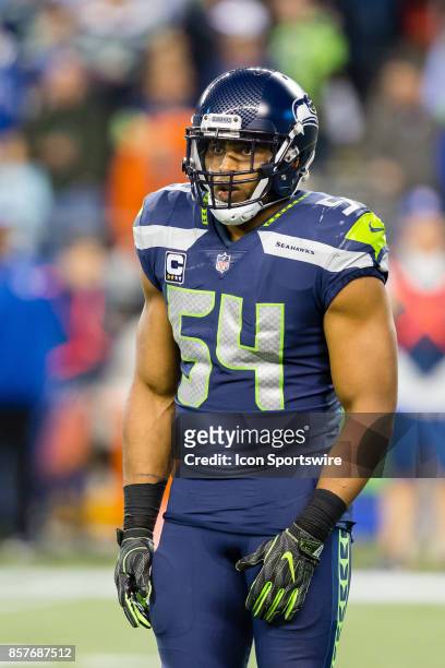 Linebacker Bobby Wagner of the Seattle Seahawks looks to the sideline for a play call during a game between the Seattle Seahawks and the Indianapolis...