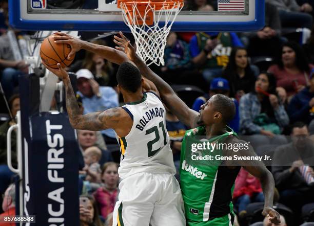 Brandon Bowman of the Maccabi Haifa tries to block the second half shot by Joel Bolomboy of the Utah Jazz during the 117-78 win by the Jazz in...