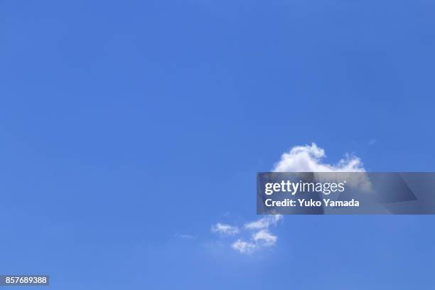 cloud typologies - white clouds in the blue sky - cloud typologies stock-fotos und bilder