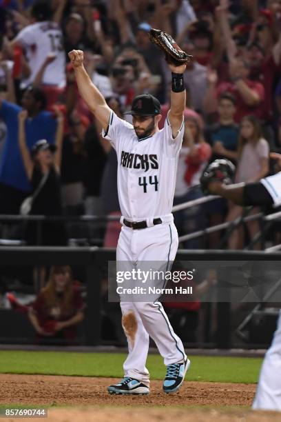 Paul Goldschmidt of the Arizona Diamondbacks reacts after beating the Colorado Rockies 11-8 in the National League Wild Card game at Chase Field on...