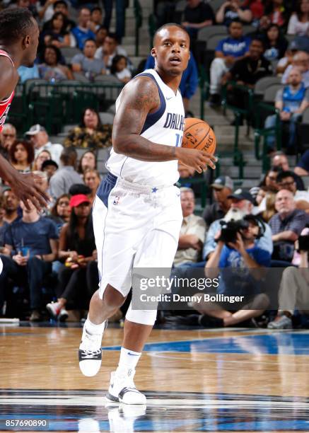 Maalik Wayns of the Dallas Mavericks handles the ball against the Chicago Bulls during the preseason game on October 4, 2017 at the American Airlines...